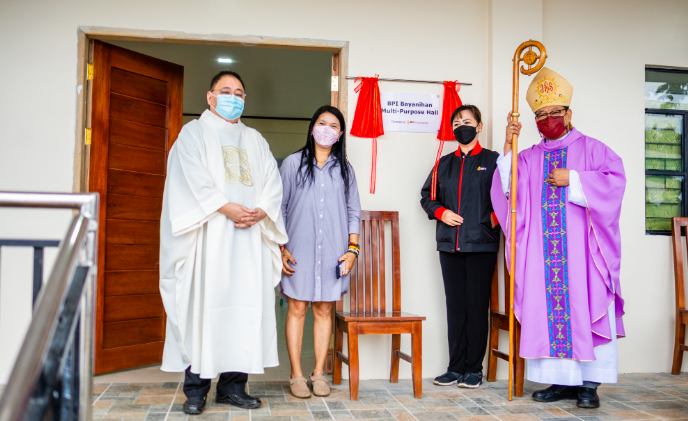 Parish Priest of St. Joseph the Worker Parish of Baggao Cagayan Rev. Fr. Gerard Ariston Perez, Baggao Municipal Mayor Joan Cabildo Dunuan, BPI Bayan Ilocos Cagayan Valley Area group leader Benalie Paguirigan, and Archbishop of Tuguegarao, His Excellency Most Rev. Ricardo Baccay during the inauguration of the new facility.